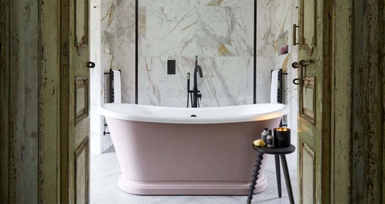 Stunning bathroom with pink free standing bath